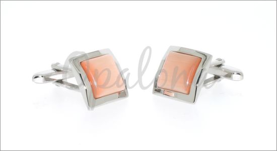 Embossed frame cufflinks with an orange cat's eye