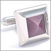 Pyramid cufflinks with a purple cat's eye